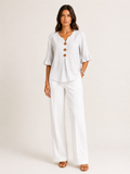 AURA | BLUSA CON BOTONES Y VOLANTES